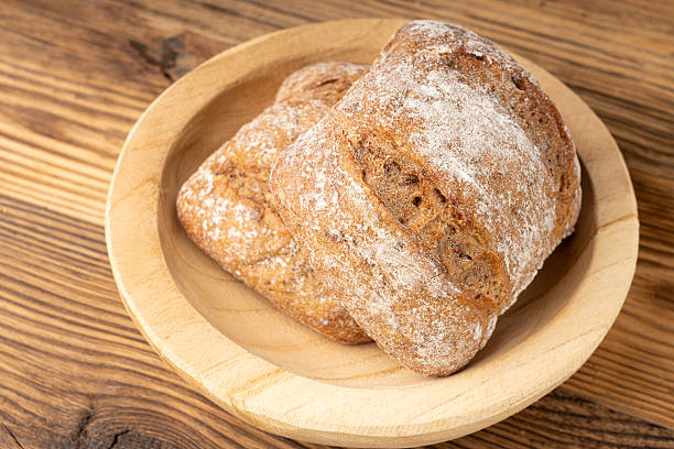 istock Brown rye bun, square gluten free bread, whole grain healthy breakfast bread 2213692549