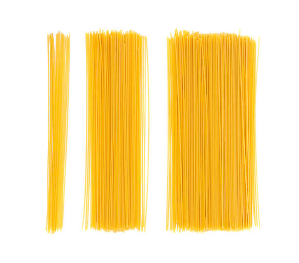 istock Raw spaghetti isolated, dry spagetti, long wheat noodles, uncooked italian macaroni bundle 2213692687