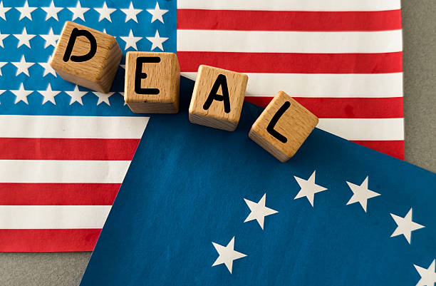 istock Letter block in word on flags background 2213692734