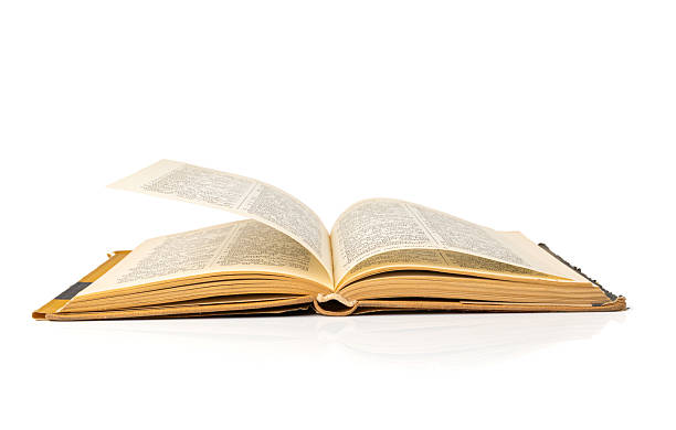 istock Old book stack pages texture. Vintage books background, antique library collection closeup 2213692748