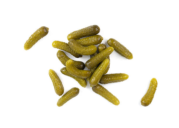 istock Gherkins isolated, pickled small cucumbers, tiny fermented food, little marinated canned vegetables 2213693852