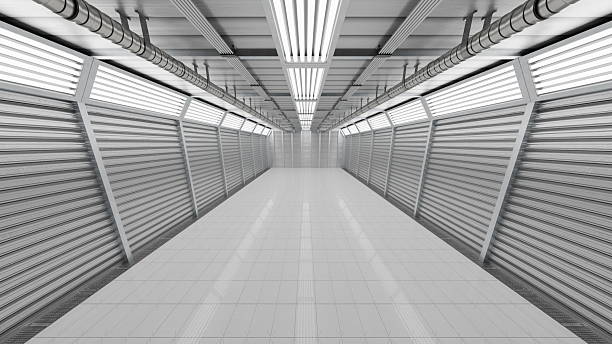 istock Wide corridor showcases sleek metallic walls and overhead bright lighting, creating a futuristic atmosphere in a spacious urban building during daytime. 3d render 2213694110