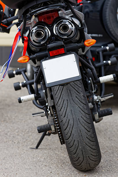 istock The rear view to the motorcycle with an blank license plate 2213702003