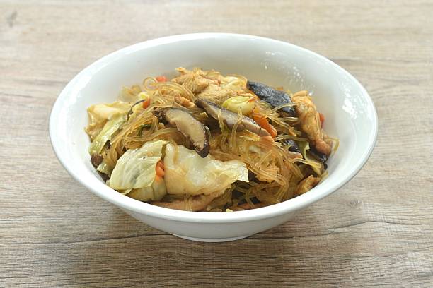istock fried glass noodles slice pork and cabbage with egg 2213704559
