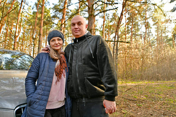 Two married couples with children went out in early spring for their first picnic in nature.