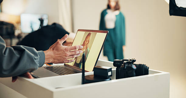 Laptop, screen and hands with photography editor in studio for production, fashion and design. Creative art, person and retouching on computer closeup for editing picture of model behind the scenes Laptop, screen and hands with photography editor in studio for production, fashion and design. Creative art, woman and retouching on computer closeup for editing picture of model behind the scenes female film editor stock pictures, royalty-free photos & images