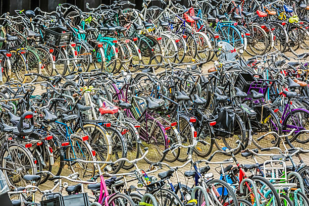 Bicycles parked in rows at train and metro station Duivendrecht near Amsterdam in the Netherlands