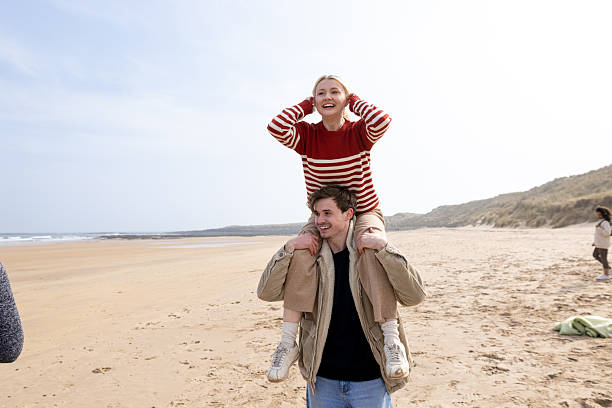 istock Happy Days at the Beach with Friends 2213714669