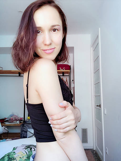 istock Nice beautiful brown-haired girl, smiling and taking a selfie. 2213716649
