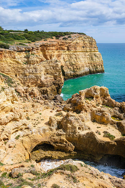 istock Rocky coastline in the Algarve (Portugal) 2213720006