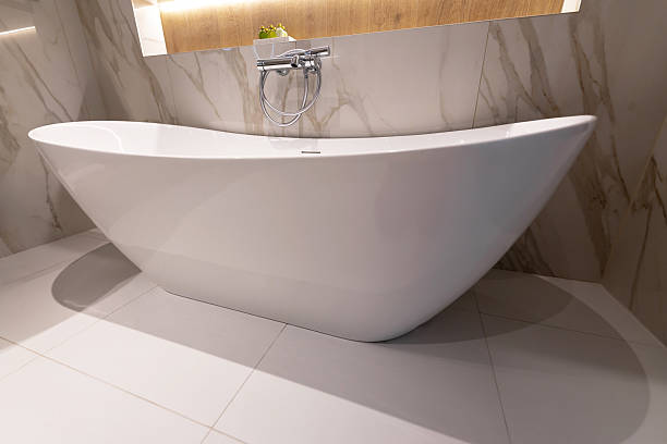 istock A modern white freestanding bathtub with elegant design in a luxury bathroom 2213720952