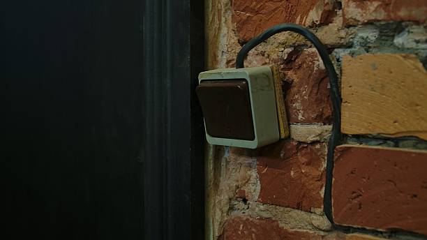 istock Old Wall Switch on Exposed Brick Background in Vintage Setting 2213726126