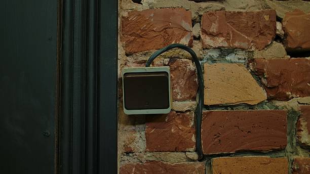 istock Old Wall Switch on Exposed Brick Background in Vintage Setting 2213726533
