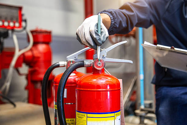 istock Engineer are checking and inspection a fire extinguishers tank in the fire control room for safety training and fire prevention. 2213730762