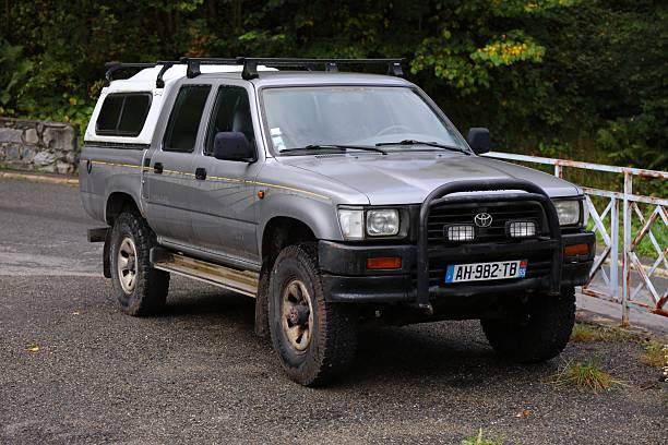 Toyota Hilux workhorse type of 4x4 vehicle parked in France.