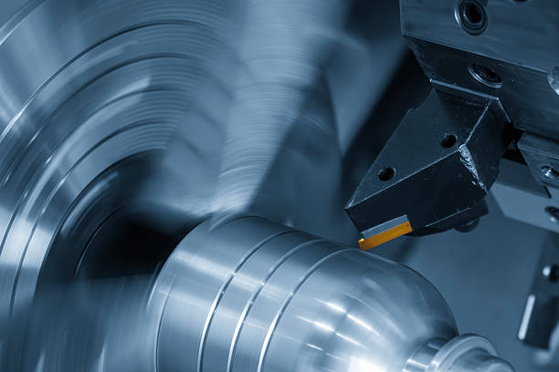 istock Close up scene the coating chip tool for CNC lathe machine in the light blue scene. 2213737143