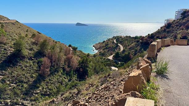 istock A Serene Coastal Road That Winds Along Scenic Cliffs Overlooking the Oceans Beauty 2213737276