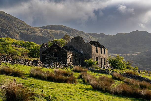 istock Building ruins left behind from Victorian era slate mining industry, Cwmstraddlyn, Dolbenmaen, Gwynedd, Snowdonia National Park, Wales, Britain 2213737445