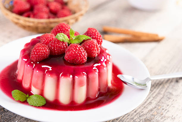 istock Delicious panna cotta dessert with raspberries sauce 2213740384