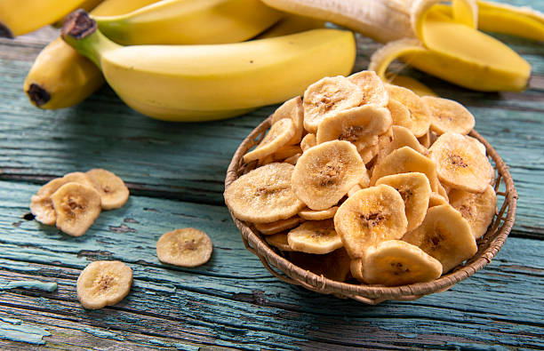 istock Dried banana slices close up 2213742119