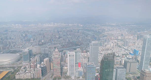Taipei city and dome covered in thick smog showing dense urban landscape skyscrapers and air pollution effects