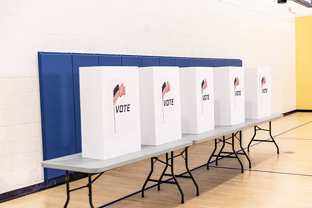 istock Voting Booths in a School Gymnasium 2213749783