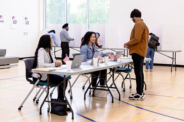 istock People Voting at Polling Place, Election Day 2213749789