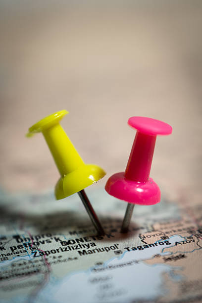 istock Two pushpins marking locations on a map of ukraine 2213750153