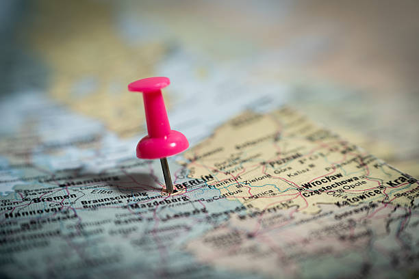 istock Pink push pin marking berlin on a map of germany 2213750159