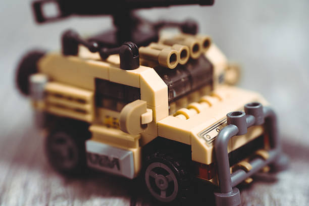 Close-up of a meticulously crafted toy military vehicle, showcasing intricate details and a sense of realism