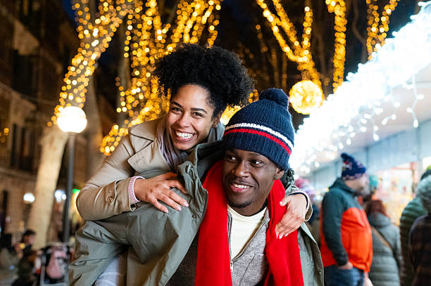 istock Couple having fun at christmas market 2213751025