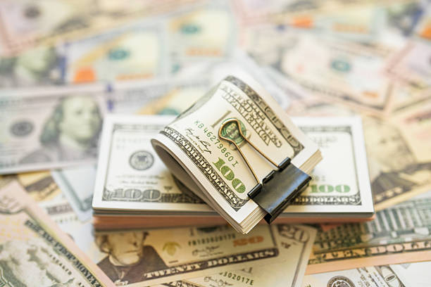 Stack of US Dollar Bills with Binder Clip – Financial Concept