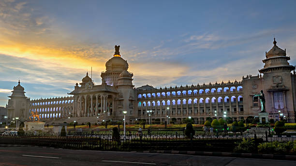 istock Intentional slow shutter , night image of largest legislative building in India - Vidhan Soudha , Bangalore with nice, colorful sky background 2213757754