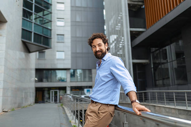 Young Businessman in Front Of Office Building