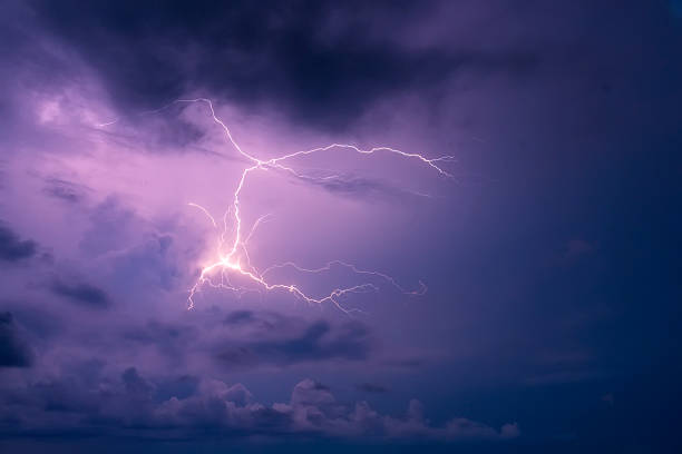 istock Strong electrical storm with a multitude of lightning strikes in clouds 2213760652