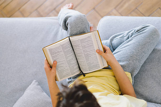 istock A boy is reading the holy bible 2213766989