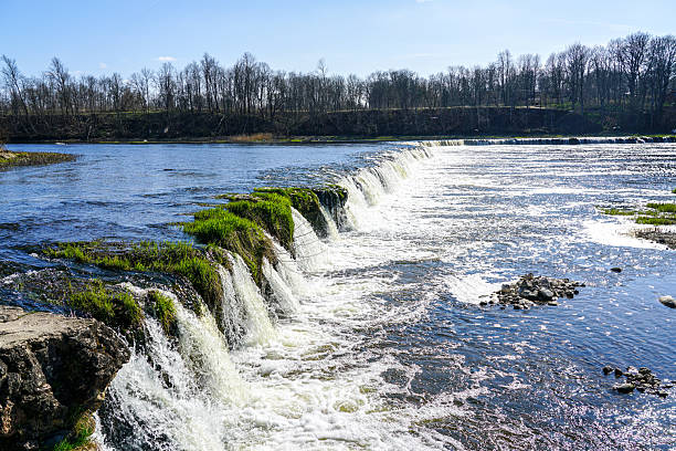 Ventas river waterfall or Ventas Rumba in Kuldiga, Latvia, sunny early spring landscape