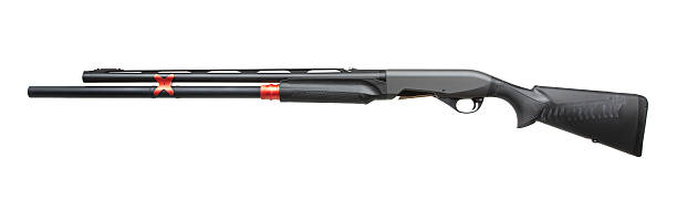istock Sporting semi-automatic shotgun with red details, angled side view, black matte finish, isolated on white background. 2213770551