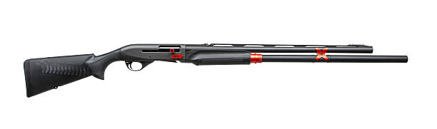 istock Sporting semi-automatic shotgun with red details, angled side view, black matte finish, isolated on white background. 2213770590