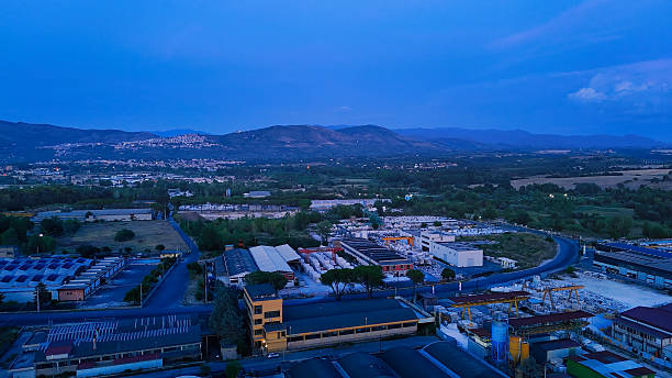 istock Marble processing factory at dawn with mountains in background 2213773004
