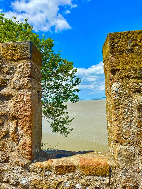 10th. Century Benedictine monks established ramparts and fortifications and soon became a major pilgrimage destination on an island in Normandy, France.