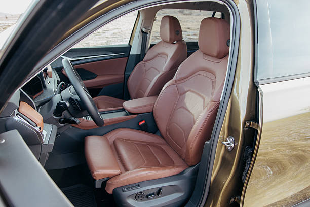 istock Car Interior: Leather seats dashboard and steering wheel showcasing luxury and comfort Interior design details of an automobile 2213780799