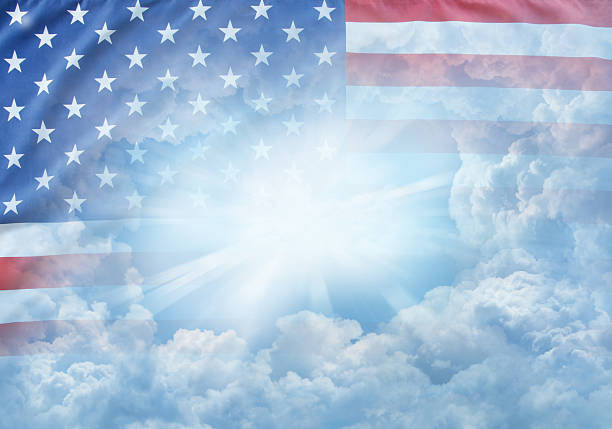 American flag in blue sky