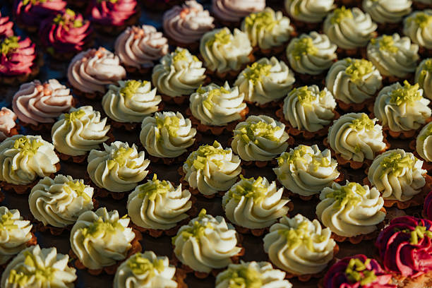 Colorful Cupcake Display: A Sweet Feast for the Eyes