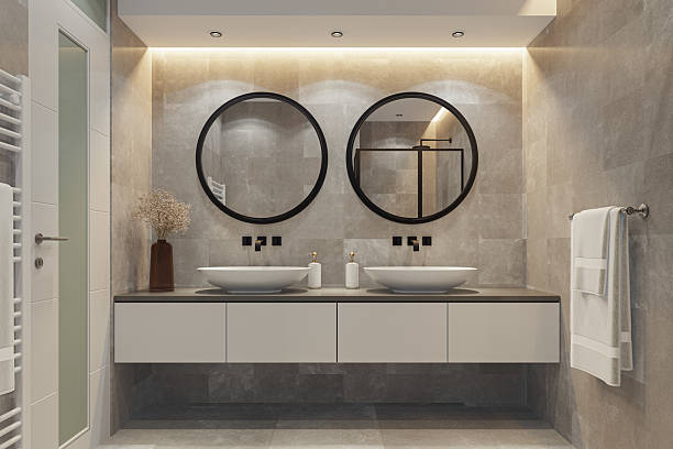 Modern Spa-Inspired Bathroom with Dual Sinks and Natural Stone Tiles