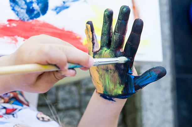 istock Painting with paints and brushes 2213795679
