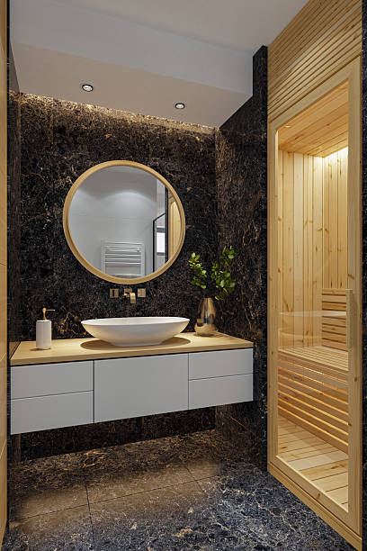 istock Compact Modern Bathroom with Pine Wood Sauna and Black Marble Accents 2213797796
