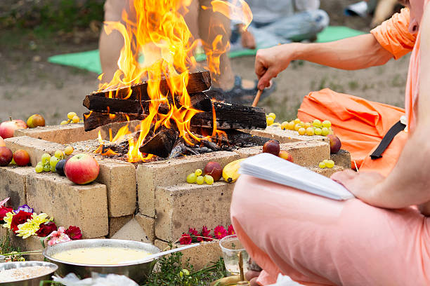 Hindu ritual with cooking and prayer reading. Religion