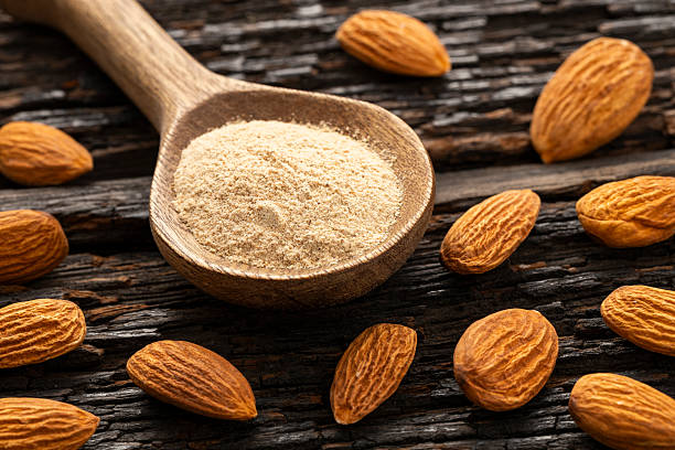istock Prunus dulcis - Ground dried almonds in a spoon 2213799568