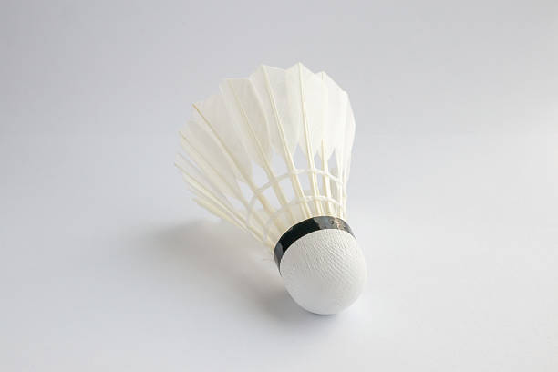 istock feather badminton shuttlecock on white paper texture background 2213800570